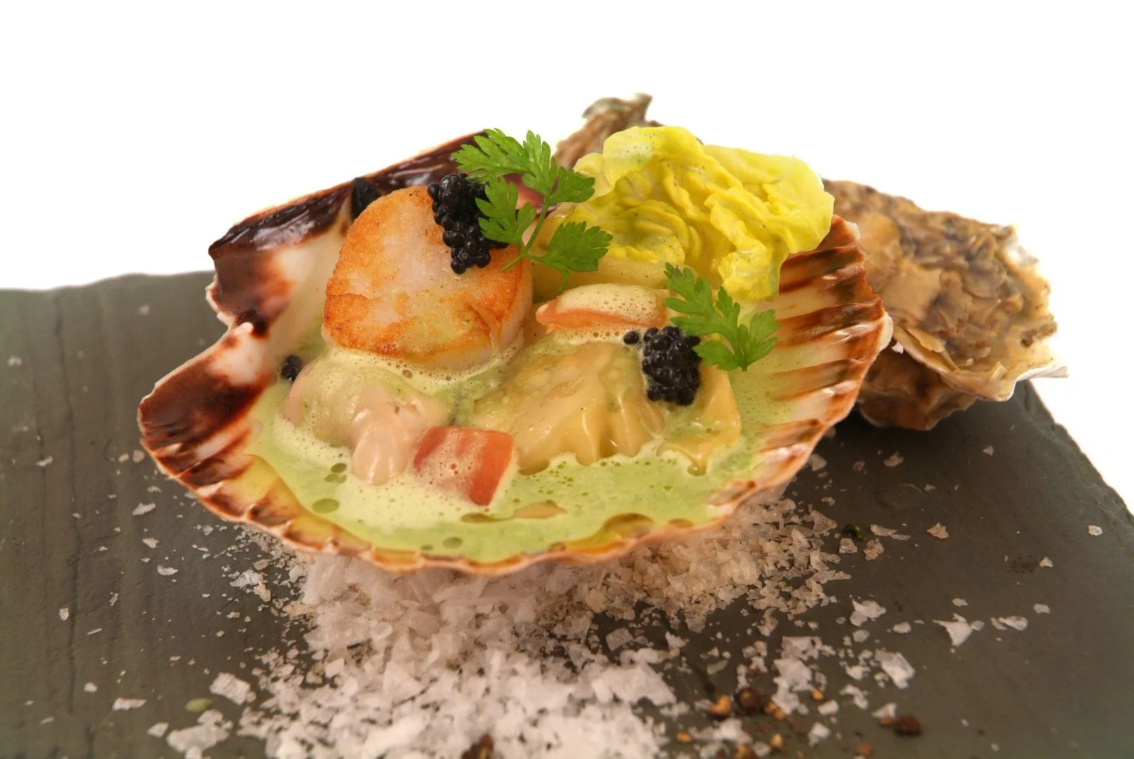 A scallop dish photographed by Goodfellows, shown as an example of its seafood cooking.